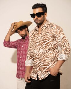 Stylish men posing in printed shirts during a studio photo shoot in Dhaka.